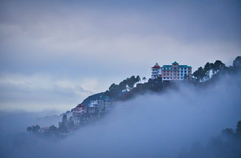 high rise building on top of mountain